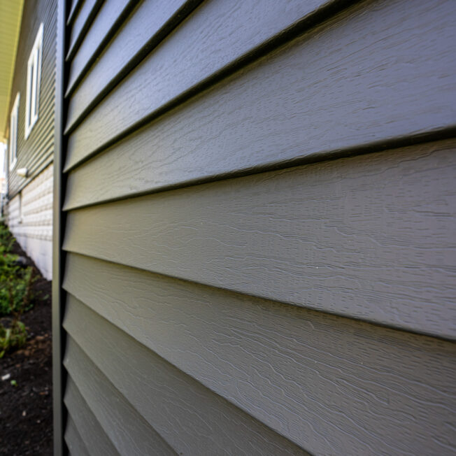 {HeartTech vinyl house siding in the color Nightfall}