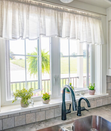 {Endure™ Casement Windows in White with Cottage Grids}