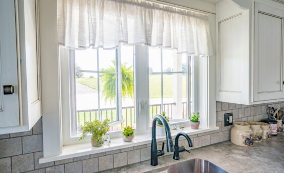 {Inside view of ProVia's Endure™ Vinyl Window in White, example of vinyl casement custom home windows}