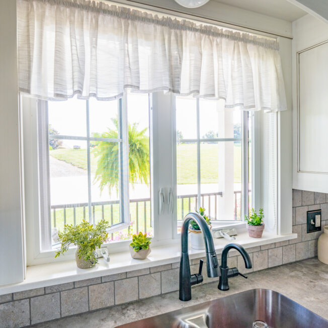 {Inside view of ProVia's Endure™ Vinyl Window in White, example of vinyl casement custom home windows}
