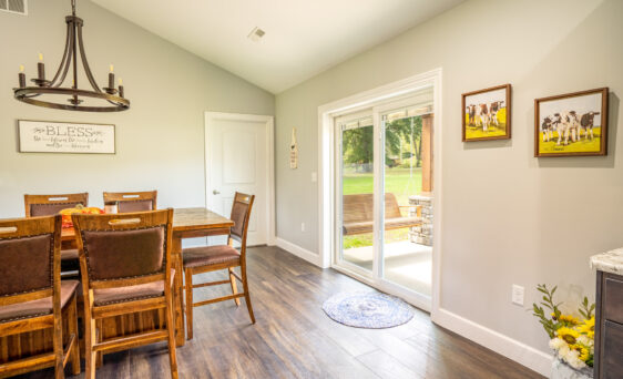 {Endure white vinyl patio doors with internal blinds in a bright, cheerful kitchen}