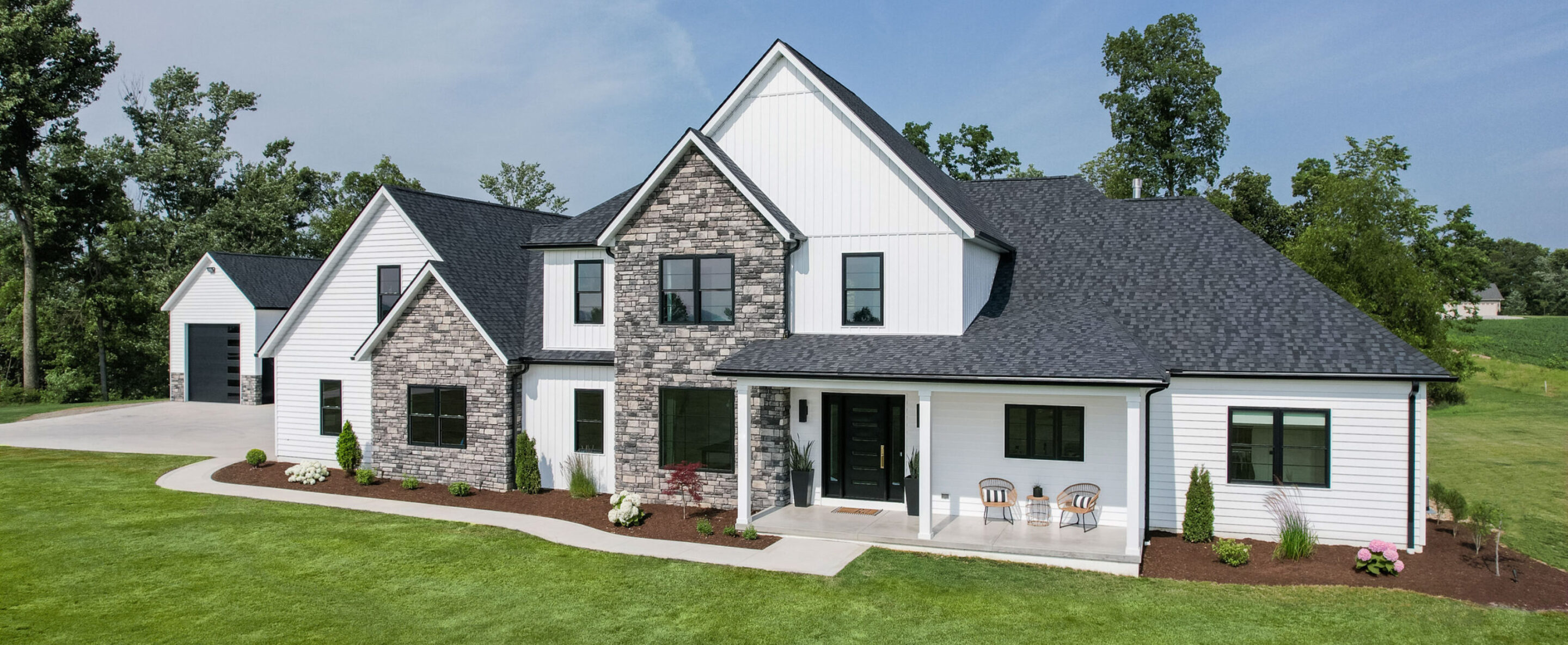 A home that shows ProVia doors, windows, siding, and stone