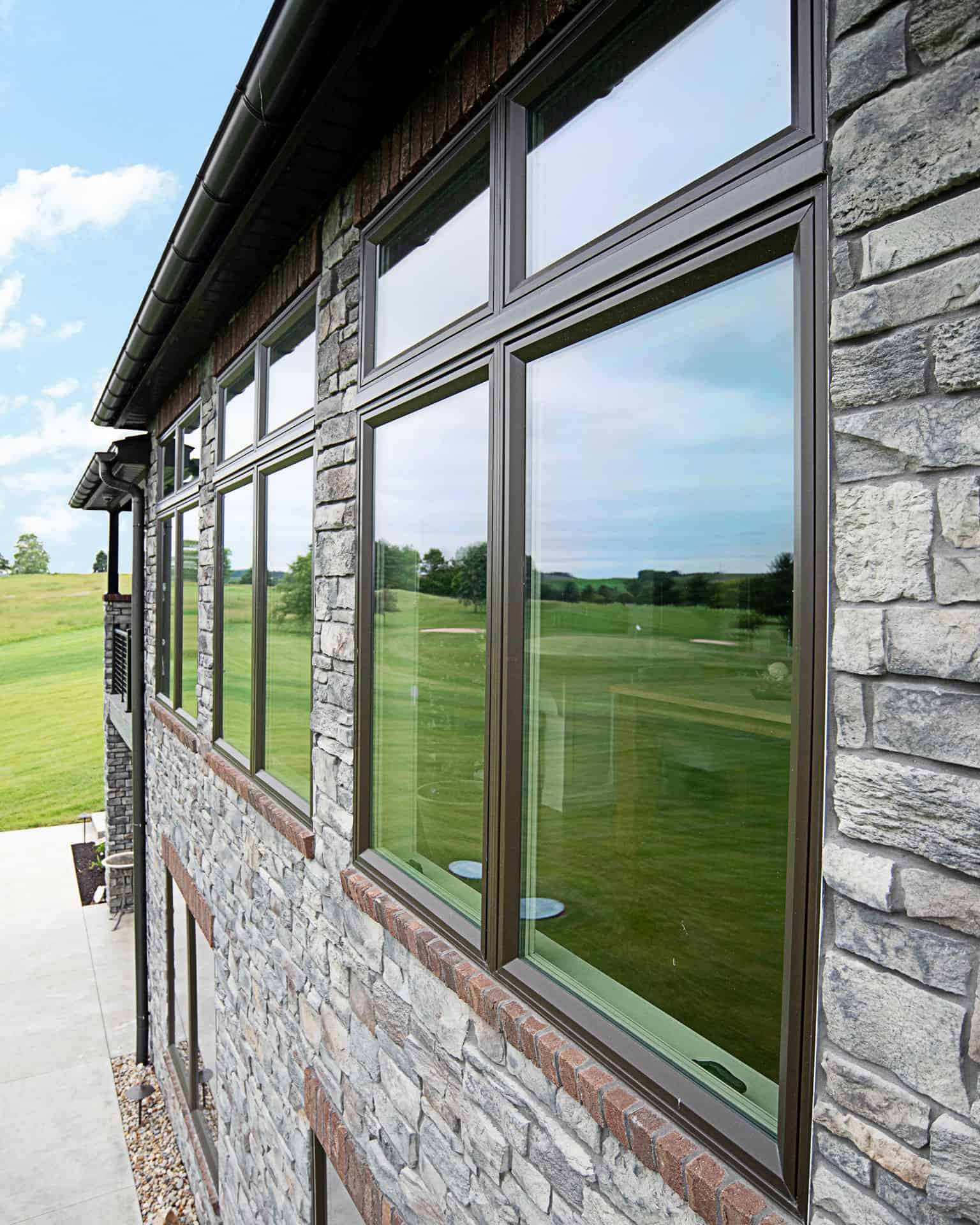 Aeris™ Casement Windows in Rustic Bronze