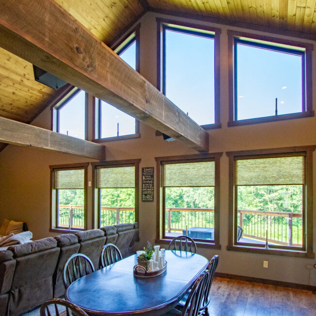 {Inside view of architectural windows in an A-frame house; example of shaped windows in ProVia's window gallery}
