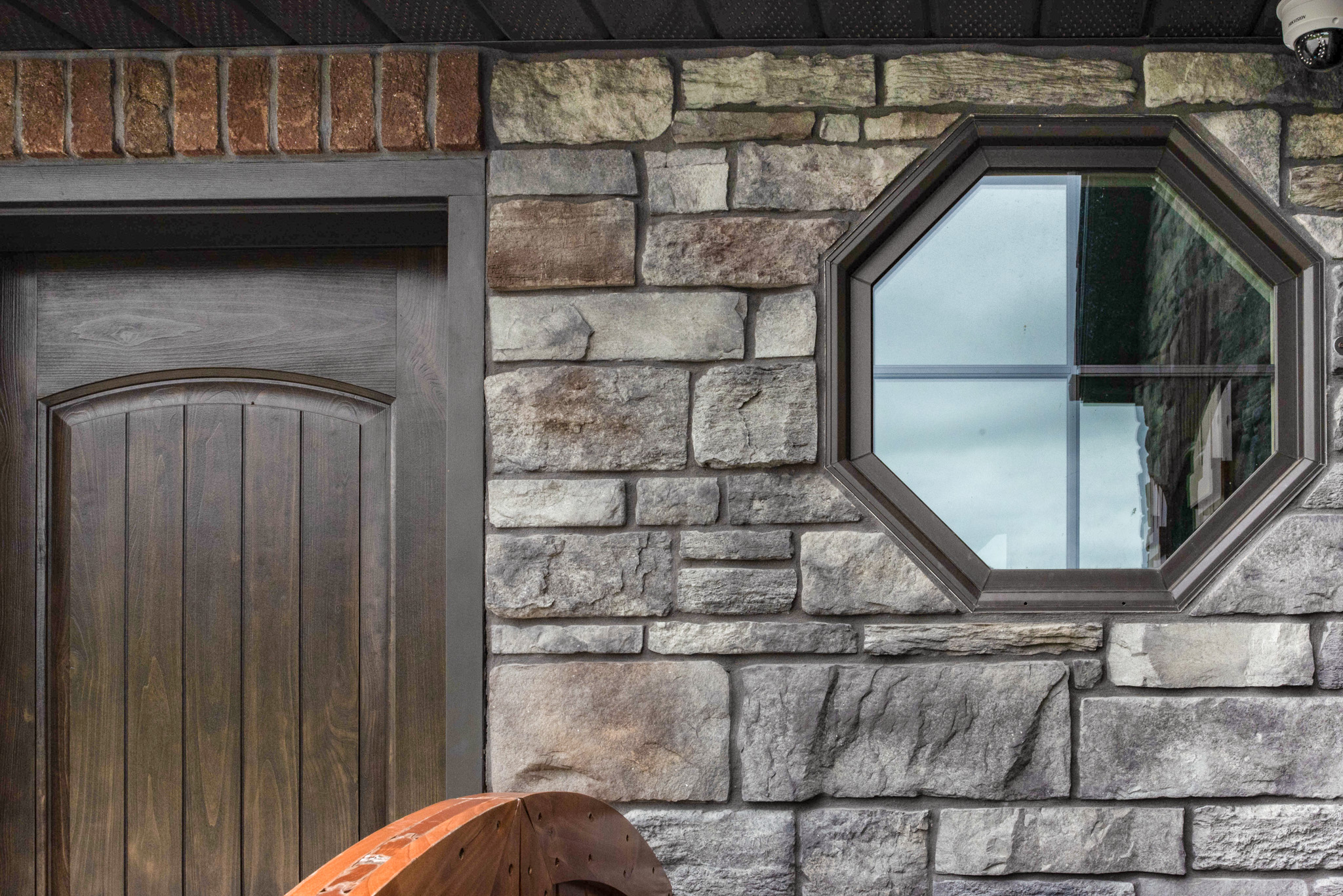 Aeris™ Octagon Shaped Window in Rustic Bronze with Cottage Grids