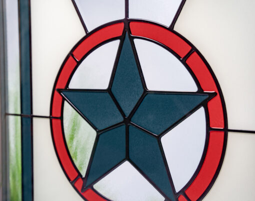 Closeup detail of Americana design for Art Glass doors and Art Glass windows. Featured colors are Enzian Blue, Vallis Red, and Snow Mist White.
