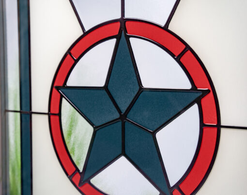 {Closeup detail of Americana design for Art Glass doors and Art Glass windows. Featured colors are Enzian Blue, Vallis Red, and Snow Mist White.}