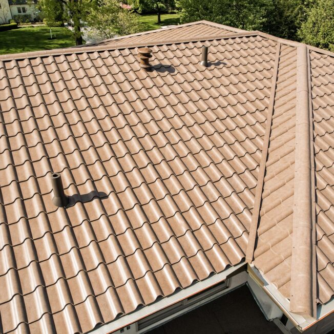 {Metal Barrel Tile Roofing in Terracotta}