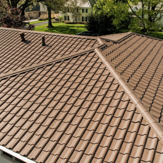 {Metal Barrel Tile Roofing in Terracotta}
