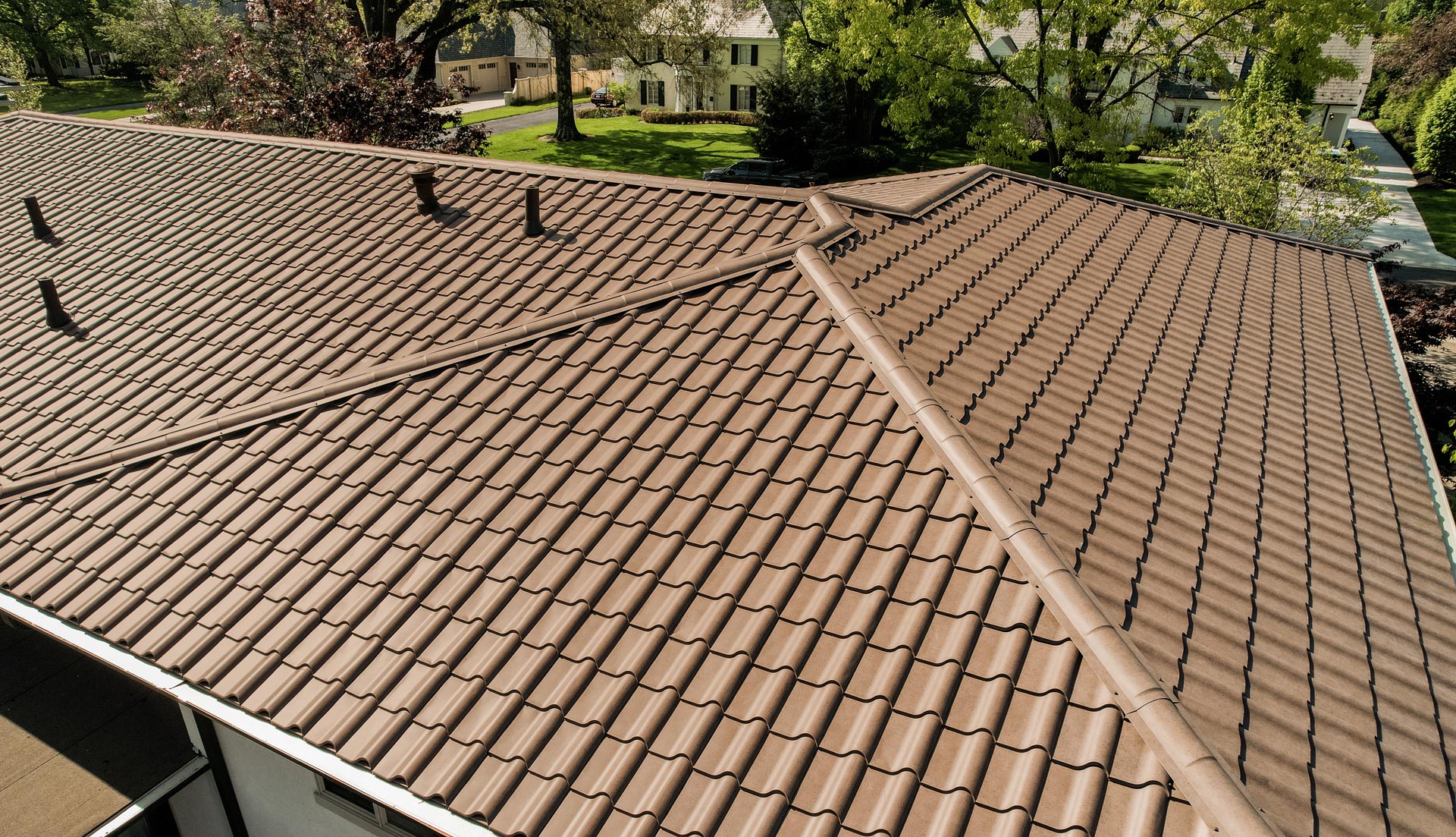 Metal Barrel Tile Roofing in Terracotta