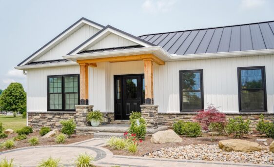 {Cedar Peaks® vinyl Board ‘n Batten in White on a craftsman-style home}