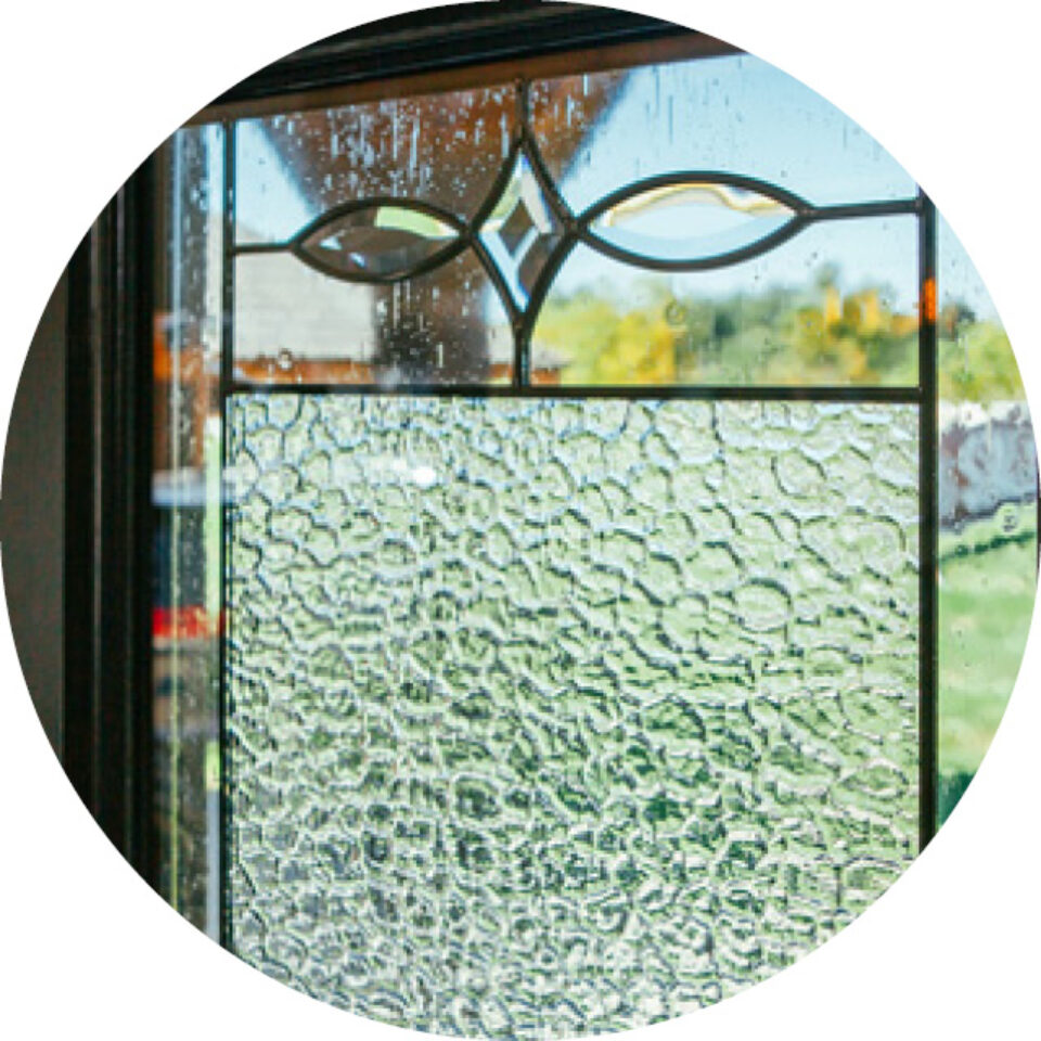 Small circle, which serves as a selector, showing ProVia® Carlisle decorative glass for front doors or windows