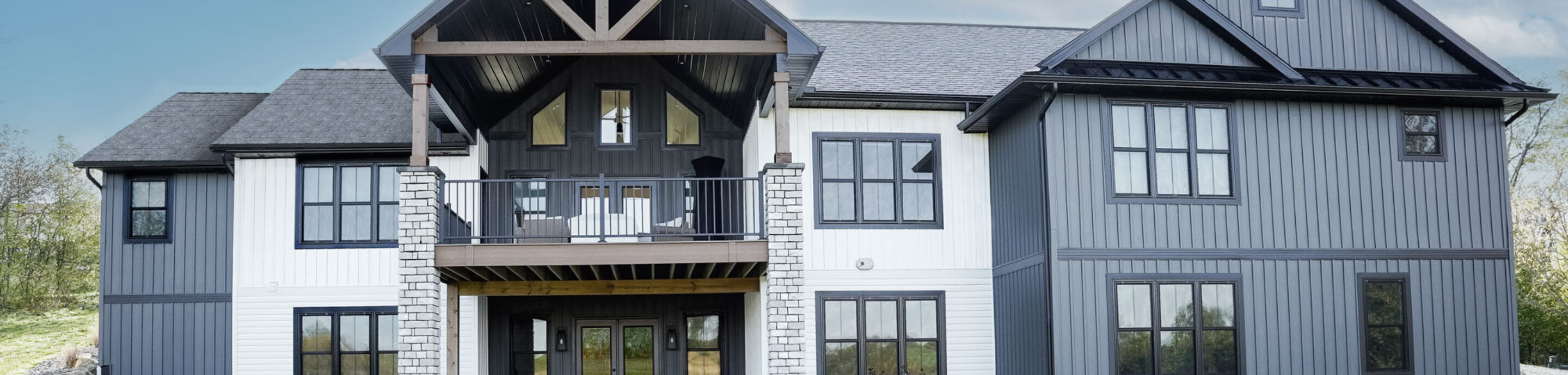 {CedarMAX® Board and Batten in Nightfall on a two-story home}