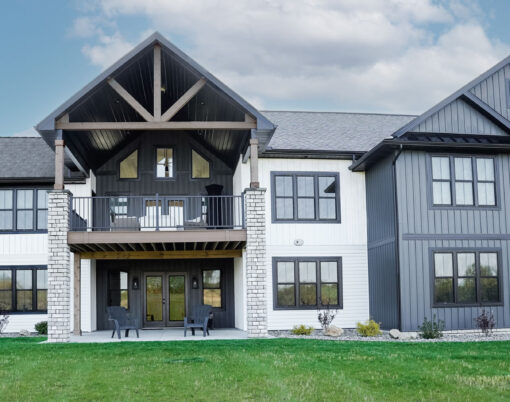 {CedarMAX® Board and Batten in Nightfall on a two-story home}