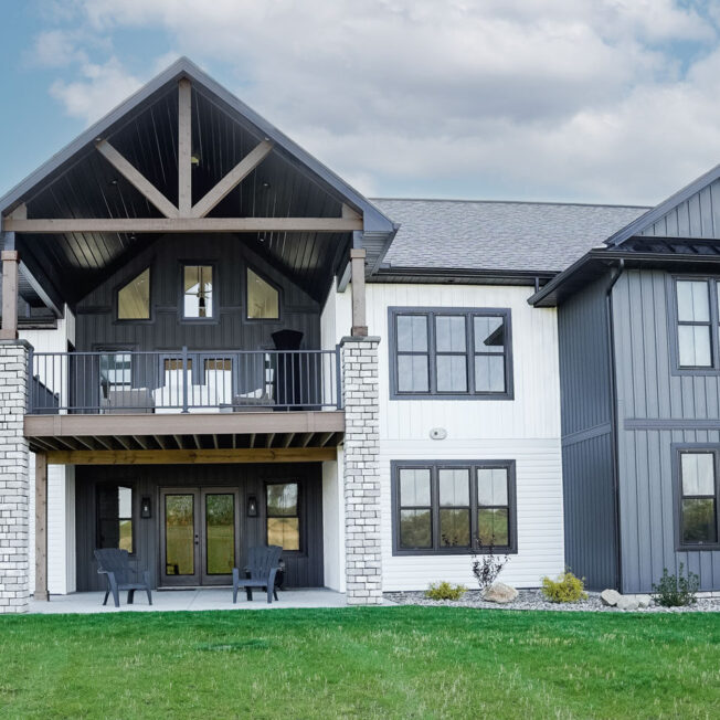 {CedarMAX® Board and Batten in Nightfall on a two-story home}