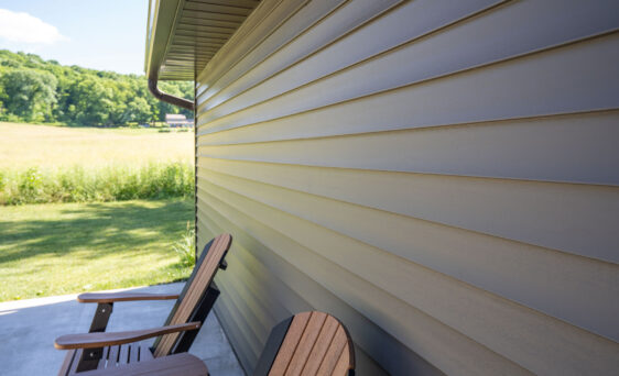 {Cedar Peaks wood grain vinyl siding in Timberline}