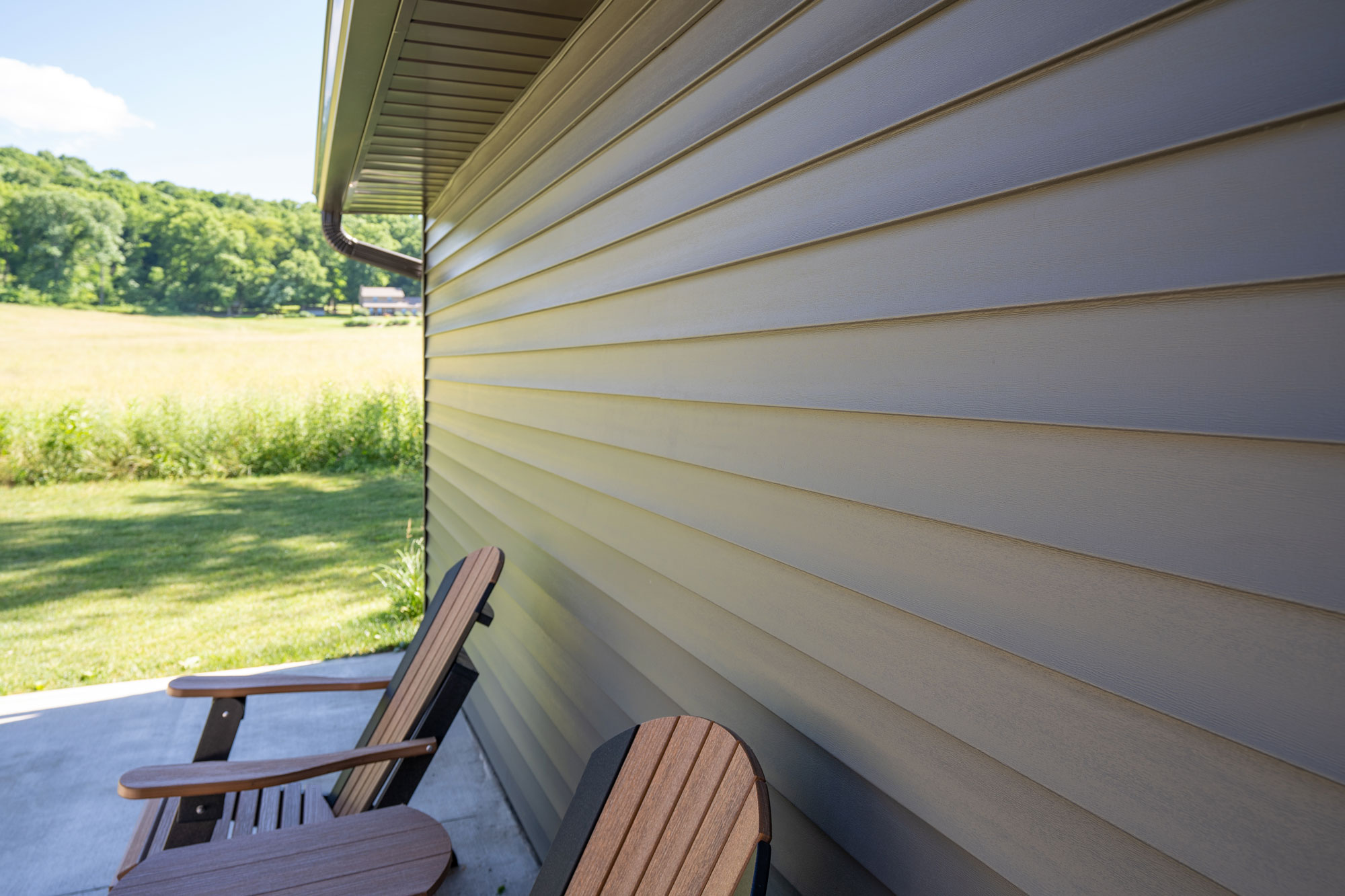Cedar Peaks® Double 4.5″ Straight Lap Vinyl Siding in Timberline
