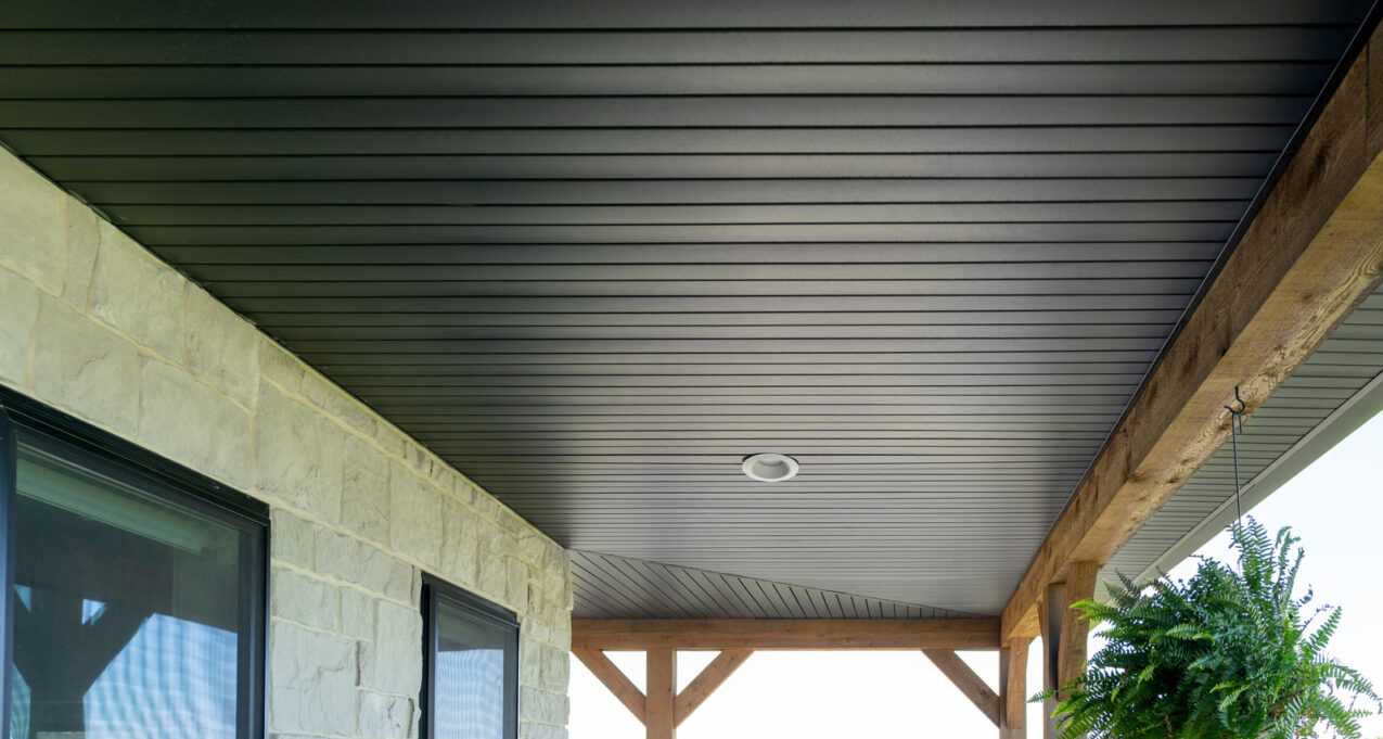 {Universal vinyl soffit in Coal Black provides a dramatic, black soffit option}