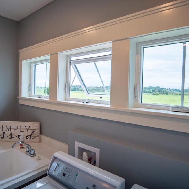 {Endure White Awning Windows in Laundry Room; example of awning windows in ProVia's window gallery}