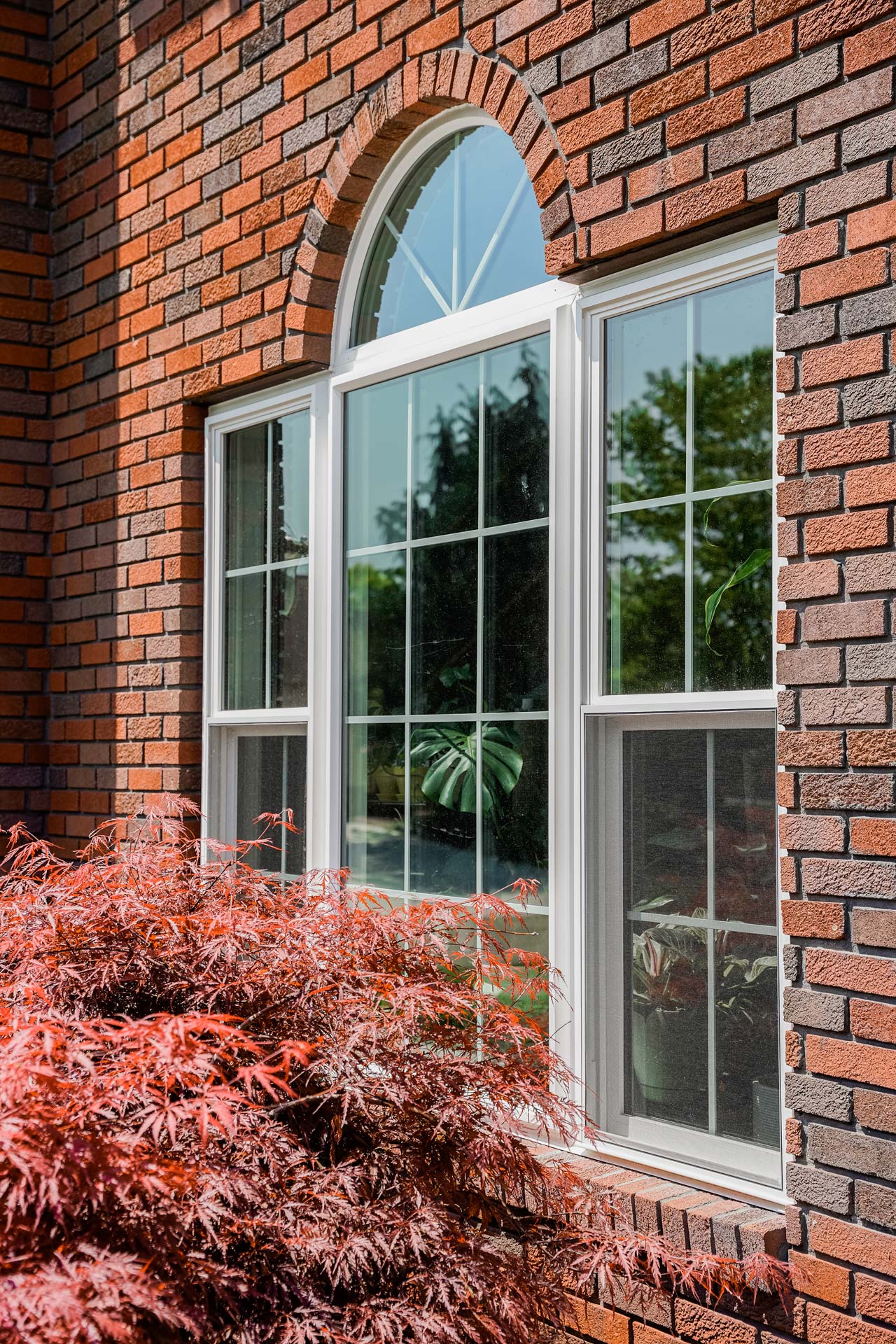 Endure™ Double Hung, Picture, and Shaped Windows in White with Colonial Grids