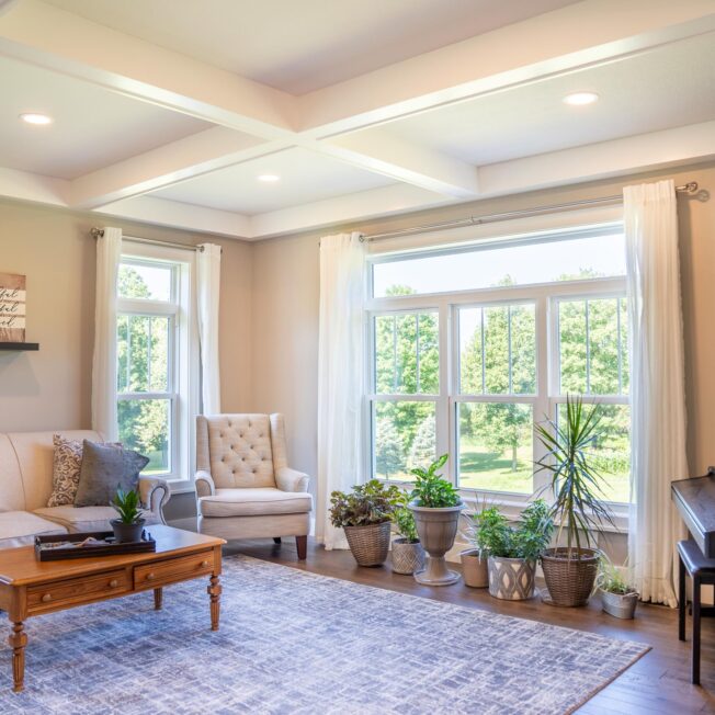 {Inside view of Endure double hung windows in white with transoms}
