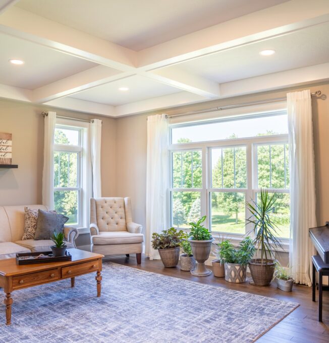 {Inside view of Endure double hung windows in white with transoms}