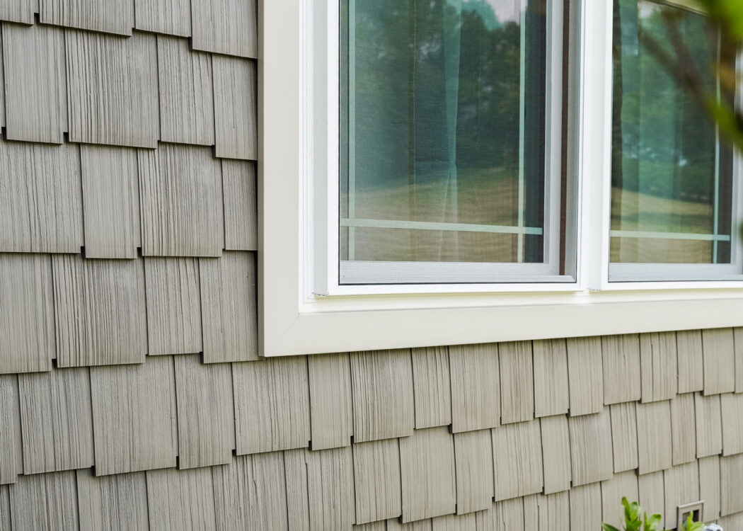 {Closeup of Harbor Mill shingle and shake siding in the color Pueblo on a house}