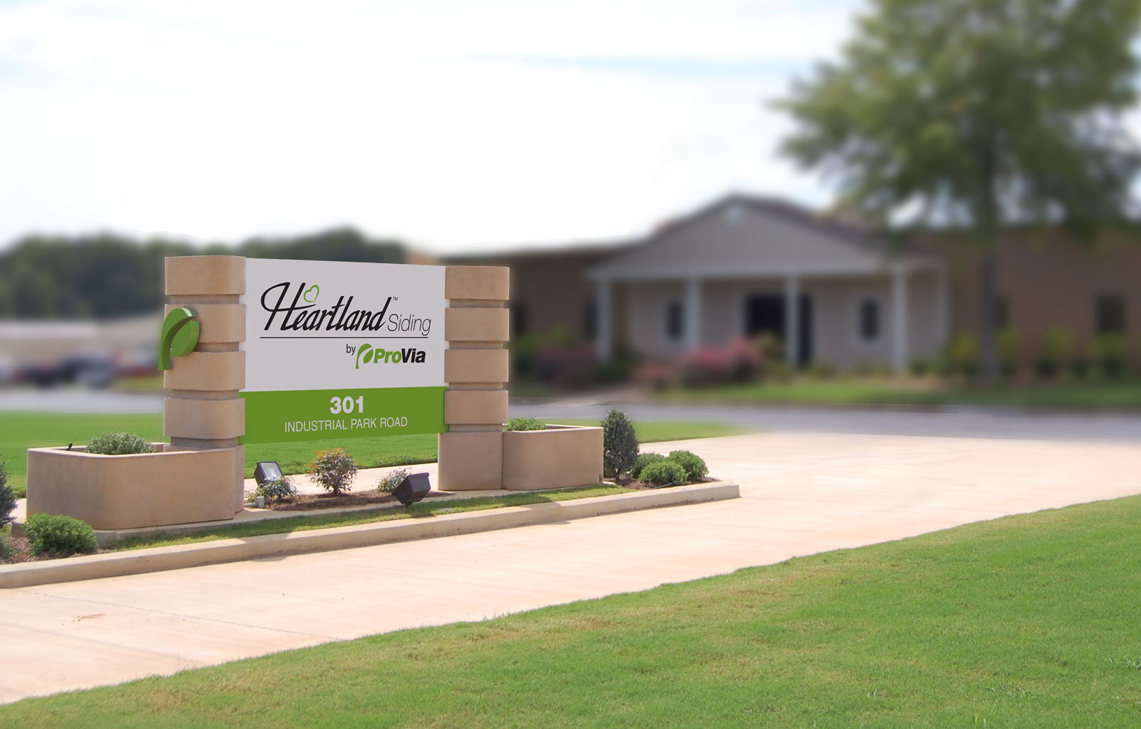 Old Heartland Siding by ProVia® facility and exterior sign before the name changed to just ProVia