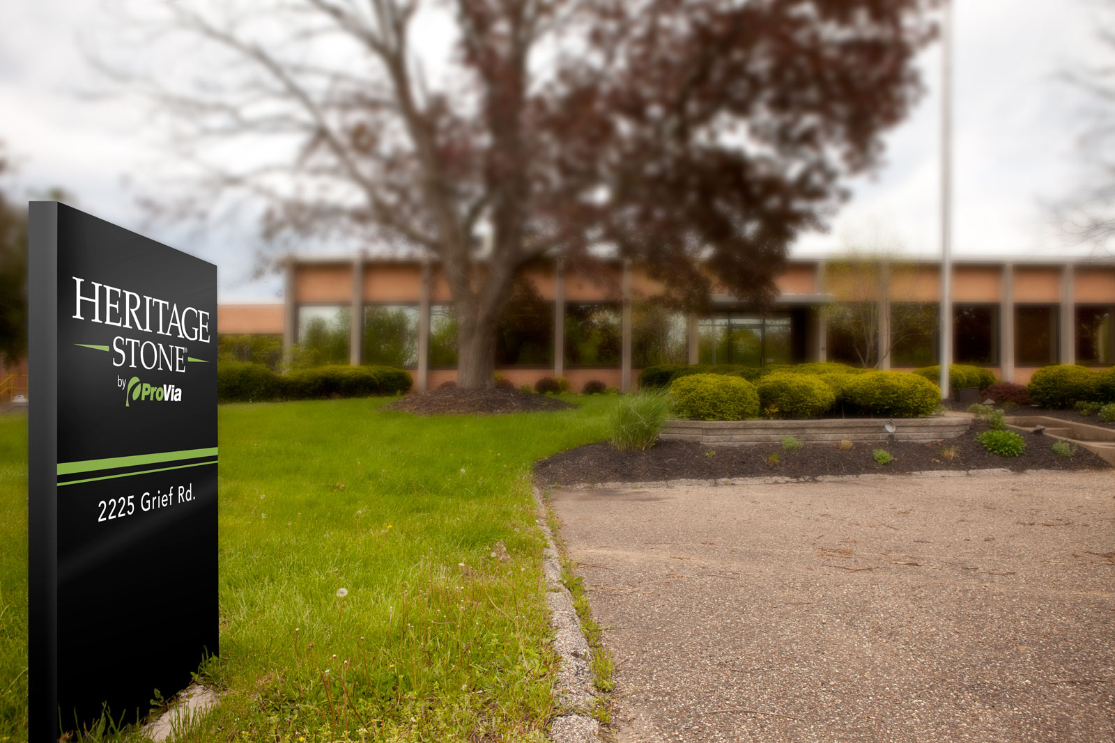 Old Heritage Stone by ProVia® facility and exterior sign before the name changed to just ProVia
