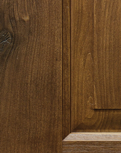 Closeup example of a Knotty Alder skin for Embarq and Signet fiberglass woodgrain textured door