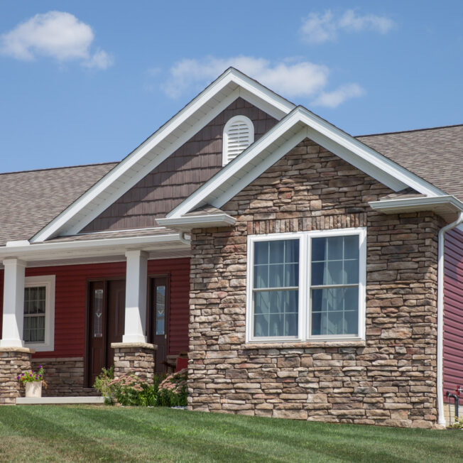 {Photo of a home with Ledgestone veneer in the color Susquehanna used as a Ledgestone exterior accent}