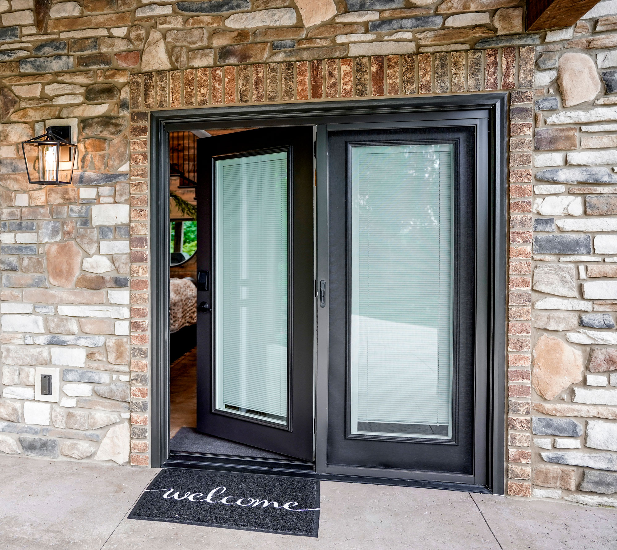 Legacy™ 460 Smooth Hinged Patio Doors in Rustic Bronze with White Internal Blinds