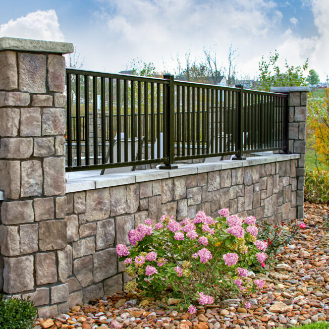 {Outdoor patio area featuring Natura Cut ProVia manufactured stone veneer in Fernwood showing how ProVia stone can be featured in different outdoor applications}