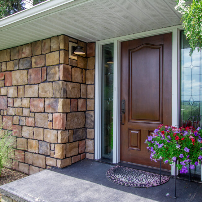 {ProVia Natural Cut™ Woodbridge Manufactured Stone home exterior}