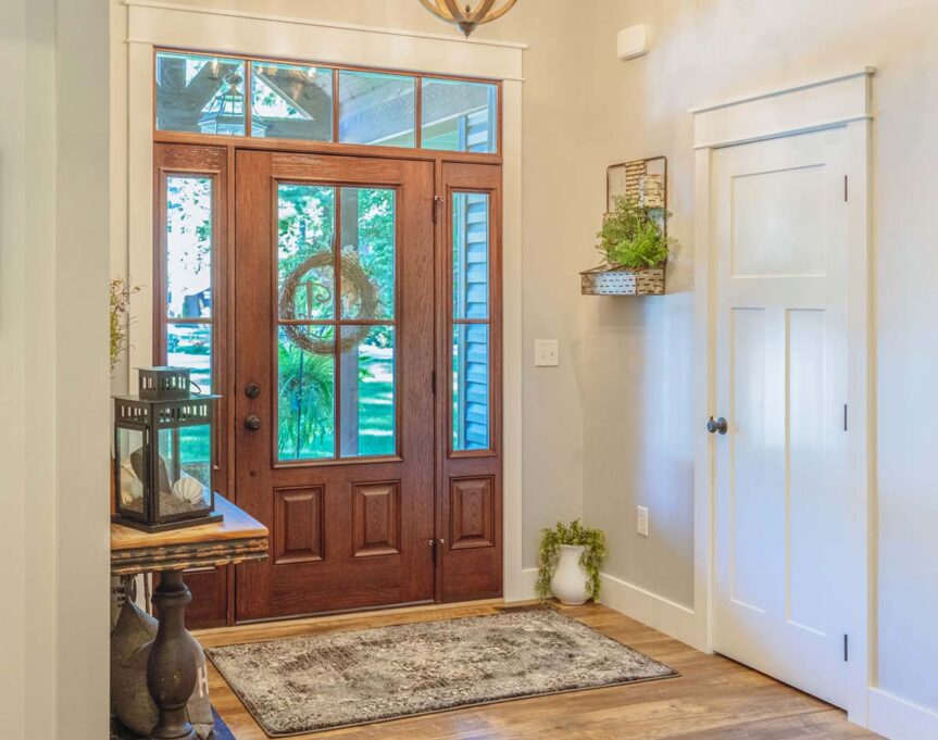 {Inside view of a Signet fiberglass door, sidelites, and transom with simulated divided lites; example of a fiberglass door in the blog article steel vs fiberglass door}
