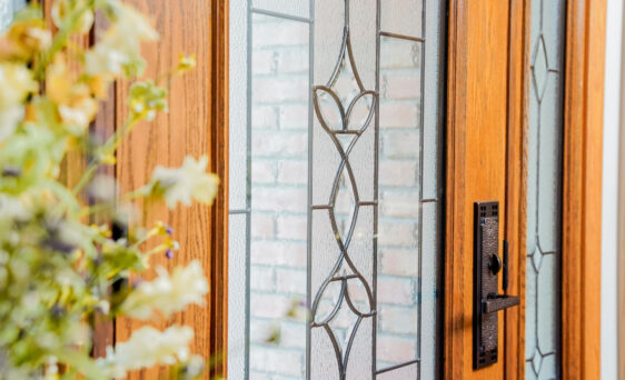 ProVia Signet oak fiberglass entry door with Caramel stain and Esmond decorative glass