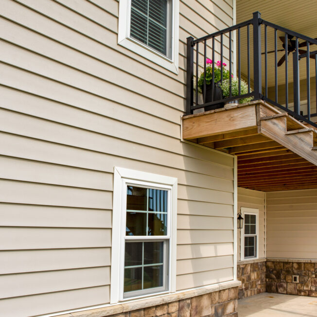 {CedarMAX insulated vinyl siding in the color Sandalwood}