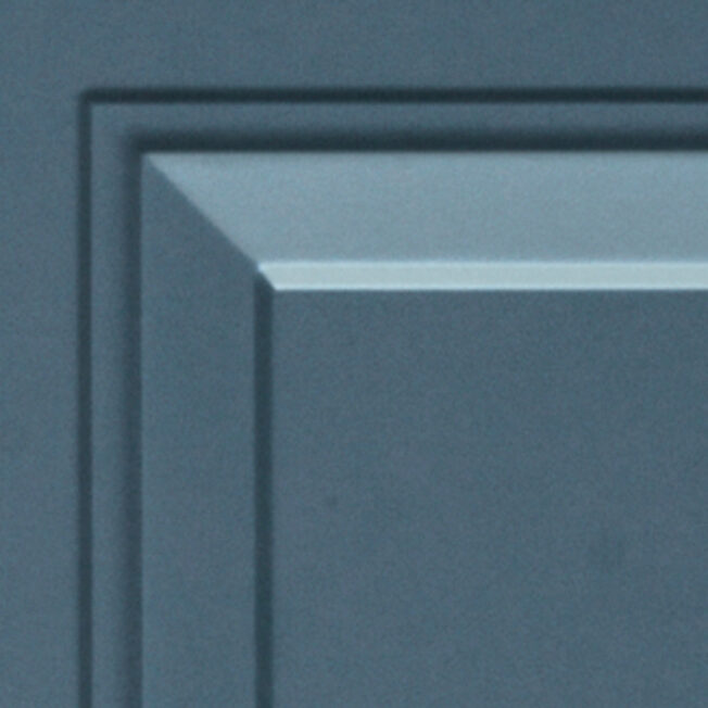 Closeup example of a blue painted door with Smooth Skin for Legacy steel doors