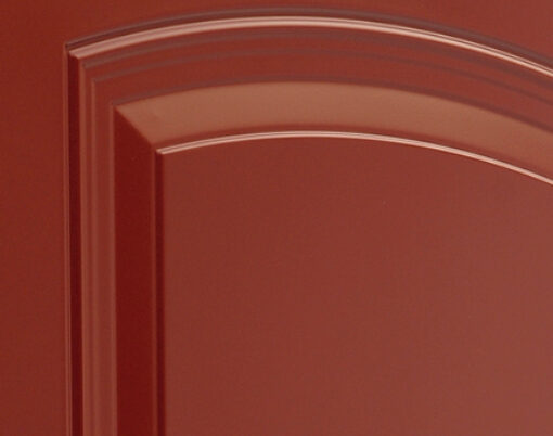 {Closeup example of a red painted door with Smooth Skin and High-Definition Embossing for Legacy steel doors}