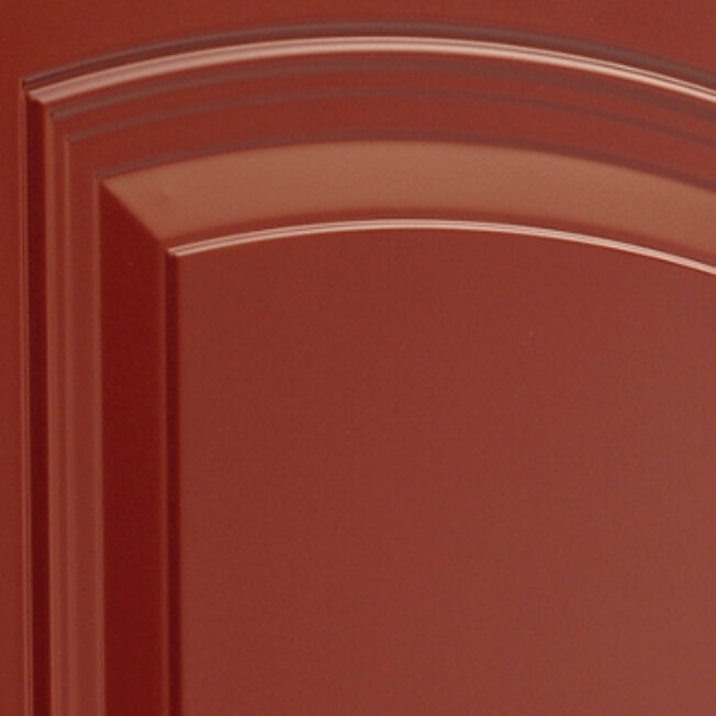 Closeup example of a red painted door with Smooth Skin and High-Definition Embossing for Legacy steel doors