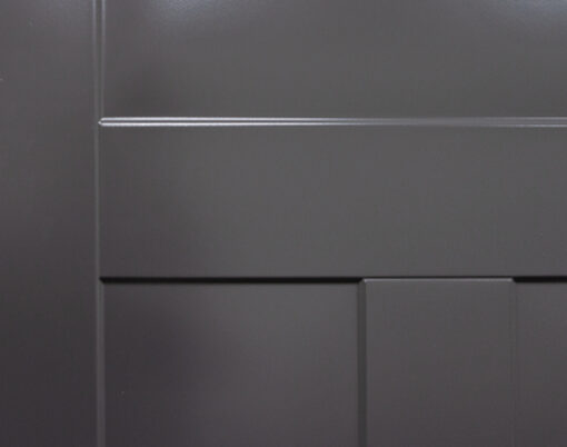 Closeup example of a deep blue Legacy steel door with smooth skin and Shaker embossing
