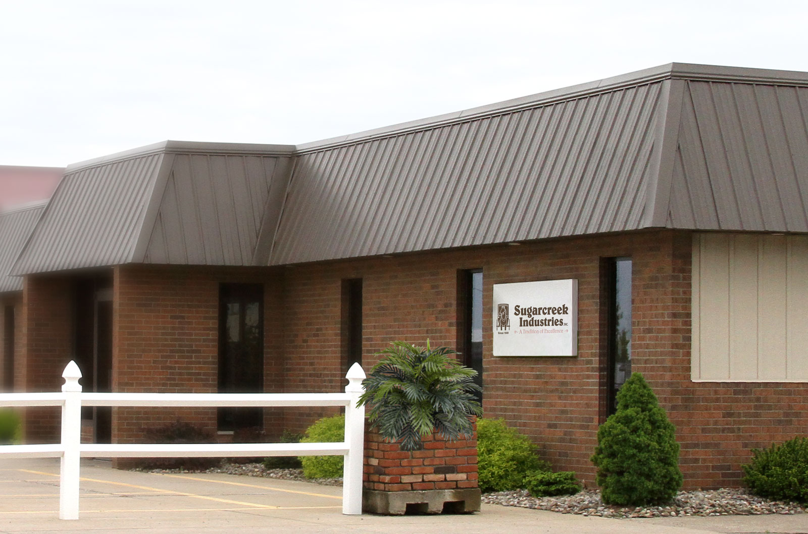Exterior view of the old Sugarcreek Industries Building after Precision Entry purchased assets of Precision Window & Door in 1995, part of the ProVia® company history.