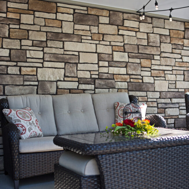 {Outdoor images showing ProVia's Terra Cut stone veneer in the color Summit; main image on ProVia's stone gallery page}