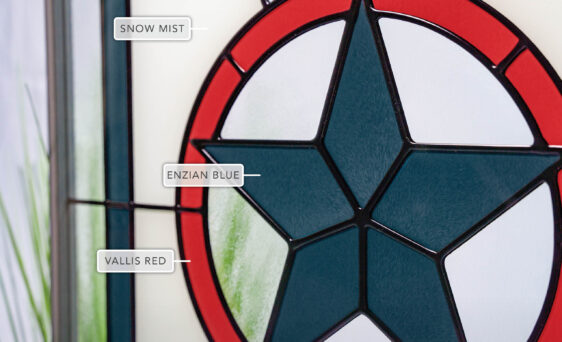 {Closeup view of ProVia Americana Art Glass doors option labeled with details}