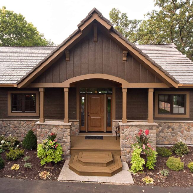 {Exterior view of Aeris™ casement windows in Classic Bronze; example of casement windows in ProVia's window gallery}