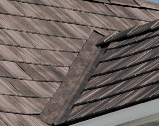{Closeup of a roof on a home showing ProVia's Briarwood Shake metal roofing with Briar Lodge Decorative Trim}