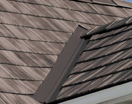 {Closeup of a roof on a home showing ProVia's Briarwood Shake metal roofing with Briar Lodge Solid Trim}