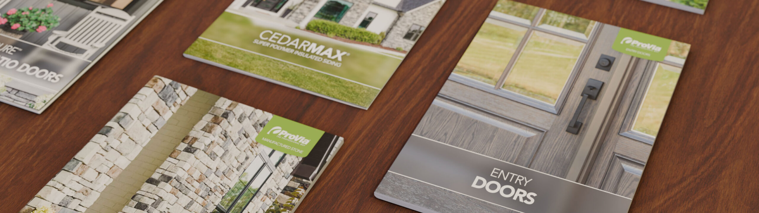 ProVia brochures on a wooden table