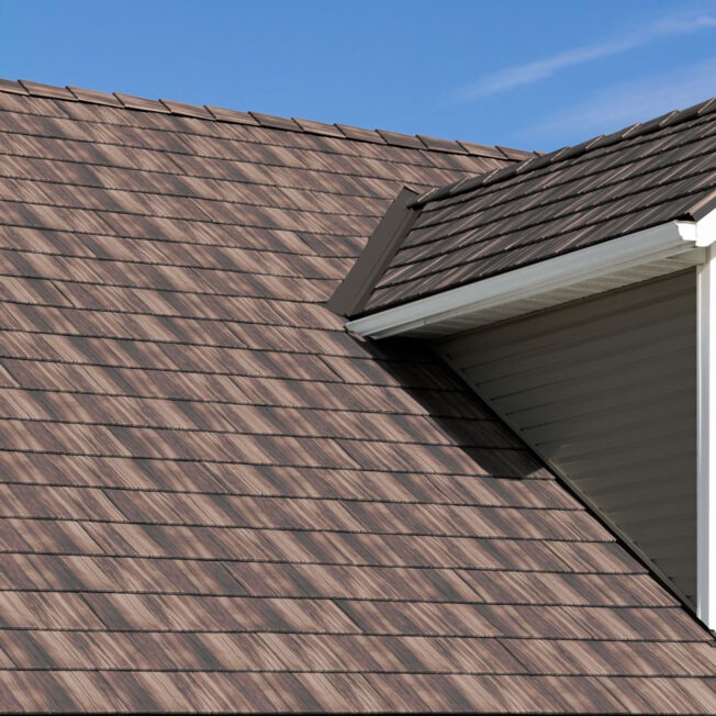 {Closeup of ProVia's Saddlewood shake metal roofing shows that metal roofs can looks like shingles}