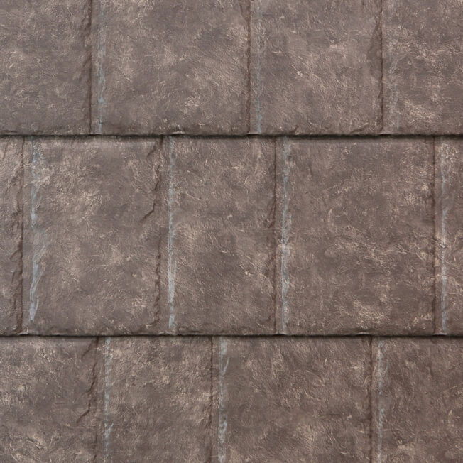 {Closeup image showing the details of ProVia's Larkstone brownish gray colored metal slate roofing }